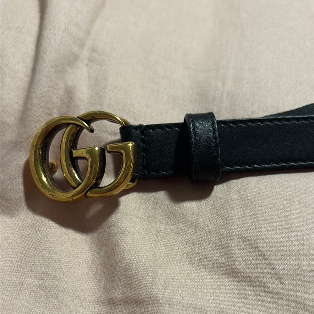 Gucci Black and Gold Leather Belt with Iconic GG Buckle